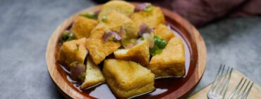 Bandung Food Tahu Gejrot on a plate and dark table