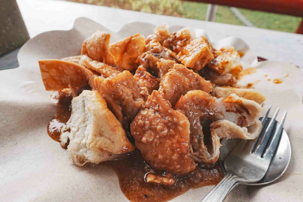 Batagor street food in Indonesia on a paper plate