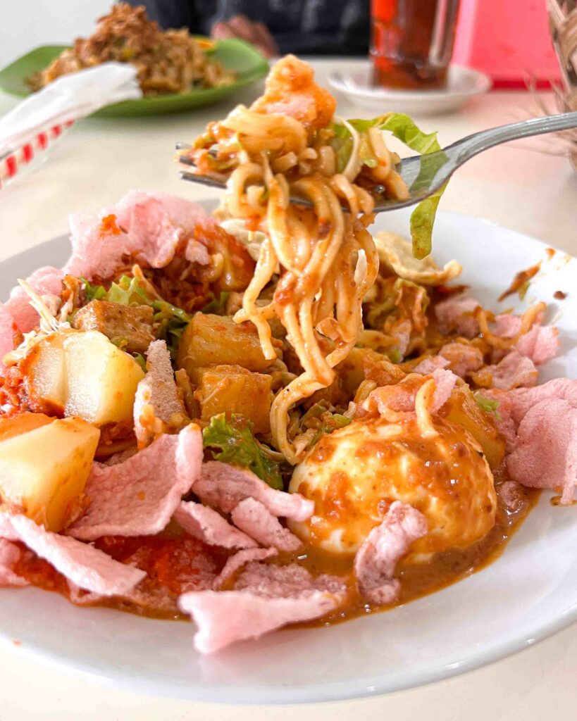 Gado gado Indonesian street food in a white plate