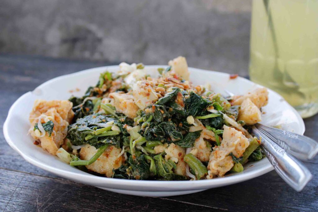 Lotek is a Javanese vegetable-based salad with peanut sauce.