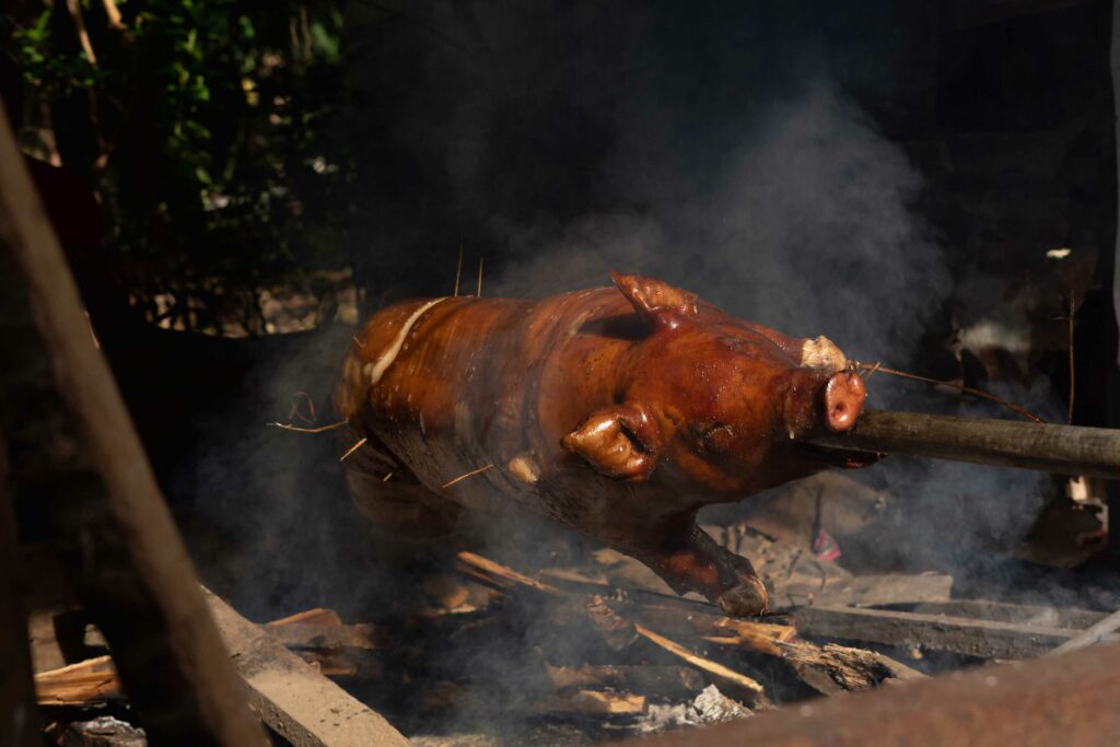 Christmas in Colombia Food Lechona or whole pork on a fire spit