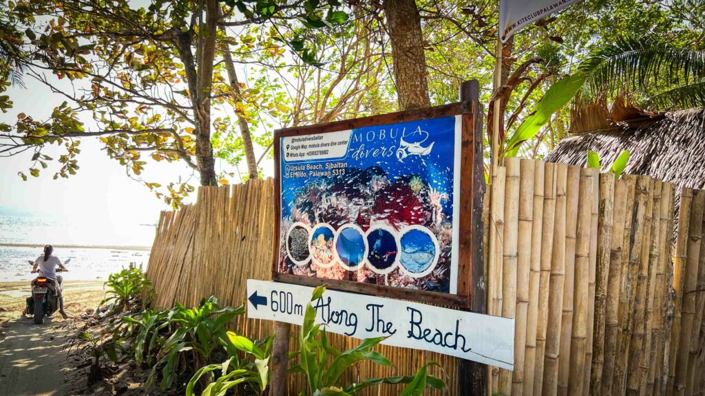 mobula divers el nido sign by the beach