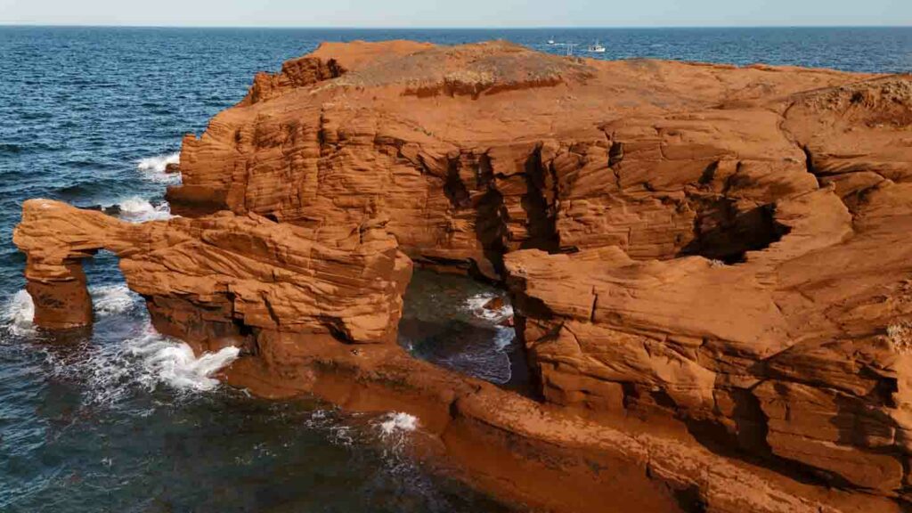 Red sandstone cliffs in the ocean at Magdalen Islands