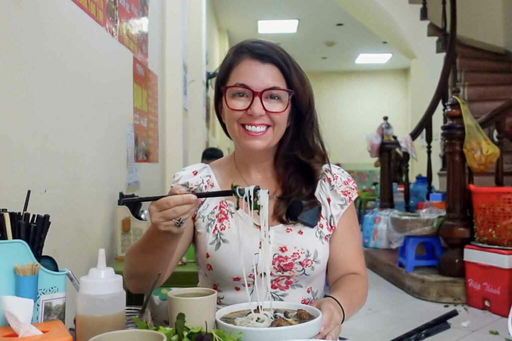ayngelina eating bun oc, snail noodle in Hanoi