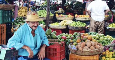 Vendor selling fruits in Honduras at the market