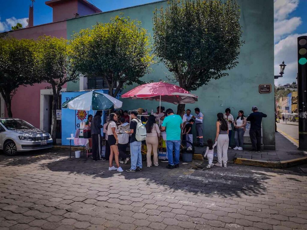 tlaxcala food taco stand in Mexico with a crowd around it