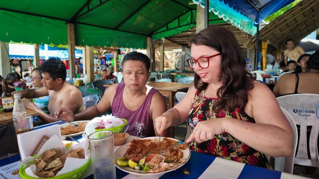 Ayngelina and Alan eating at Los Gastronomicos Puerto Escondido beach restaurant