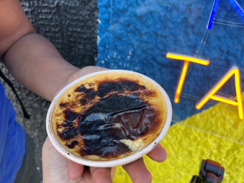 Jericalla dessert in man's hand in Guadalajara