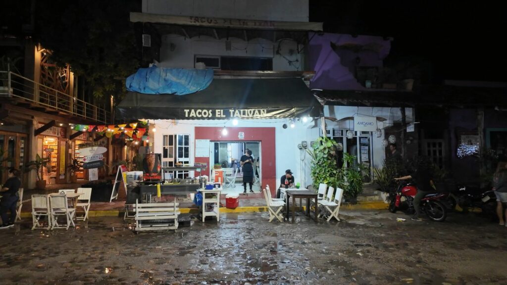 Tacos El Tal Ivan at night, exterior of building in Sayulita