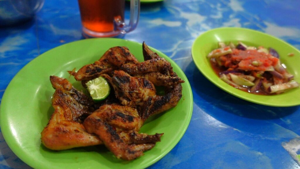 Ayam Taliwan a traditional dish in Lombok on a table at a local restaurant