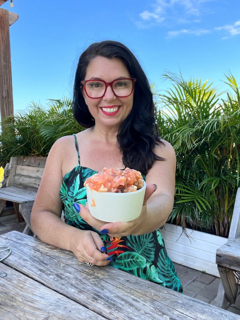 ayngelina and shrimp cocktail at restaurant on beach in Santa Marta Colombia