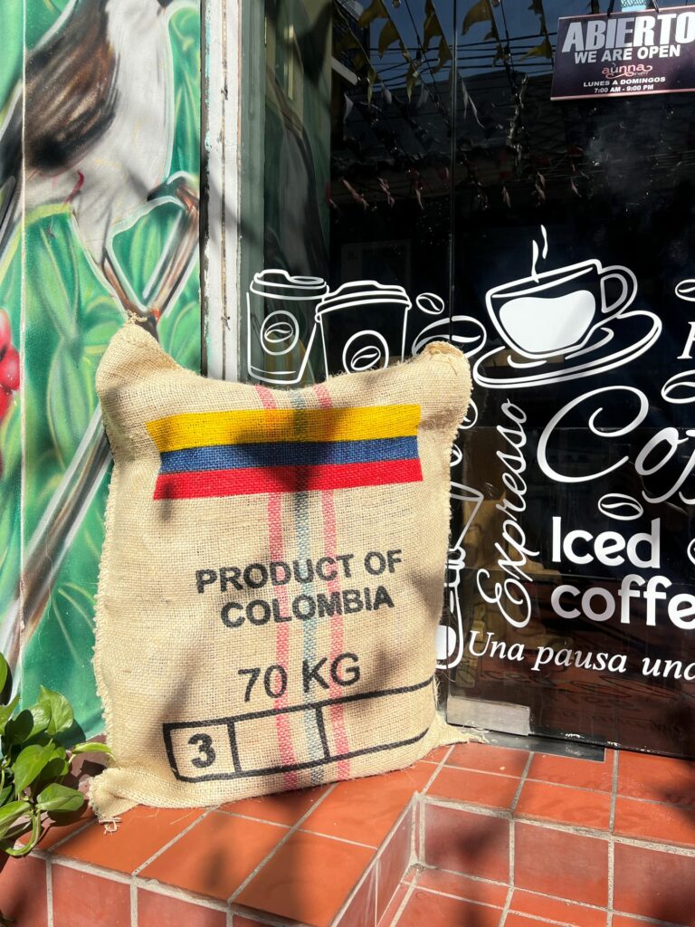 Straw bag of Colombian coffee 70kg outside a cafe in Cartagena