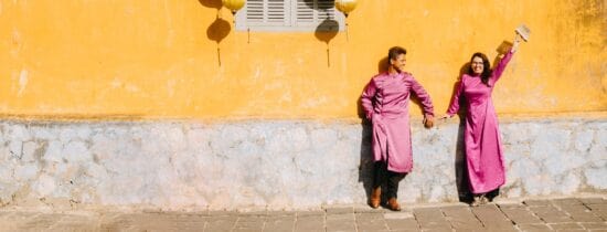 ayngelina and alan in Hoi An Vietnam in traditional Ao Dai dress